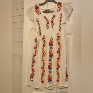 White dress embroidered flowers